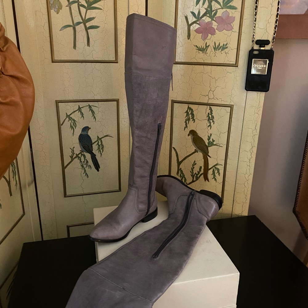 Over the knee leather boots.